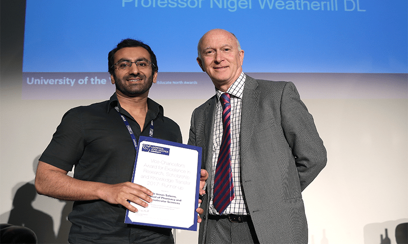 Dr Imran Saleem receiving his award from LJMU Vice-Chancellor Professor Nigel Weatherill