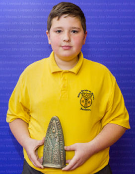 Image of Ewan Jones holding bronze Good Citizenship award